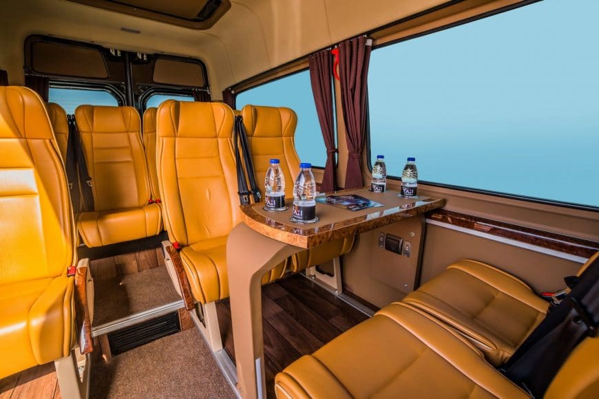 Luxury Transfer Services in Crete. Luxurious black Mercedes minibus interior with leather seats.